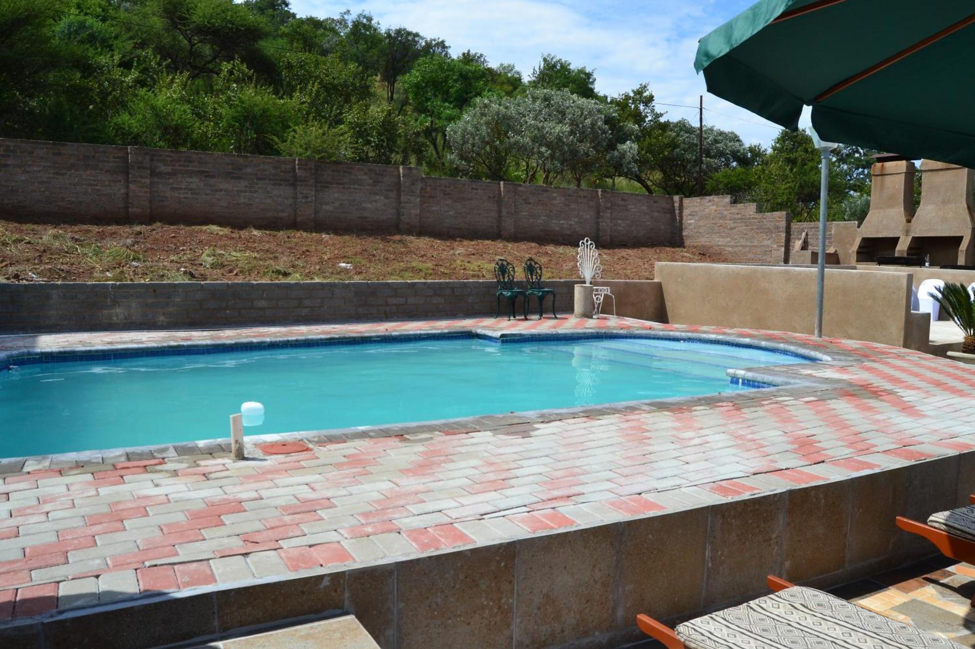Kamogelo Guest House พีลาเนสเบิร์ก ภายนอก รูปภาพ