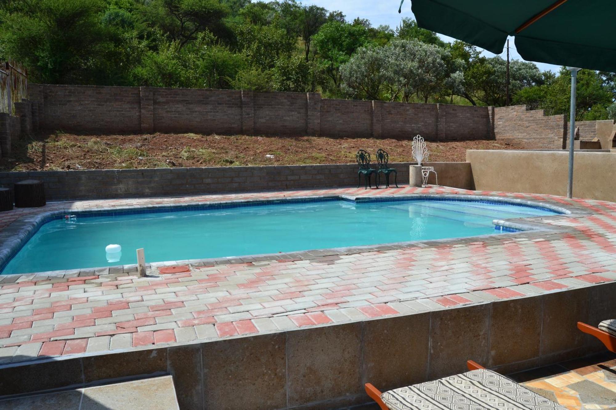 Kamogelo Guest House พีลาเนสเบิร์ก ภายนอก รูปภาพ